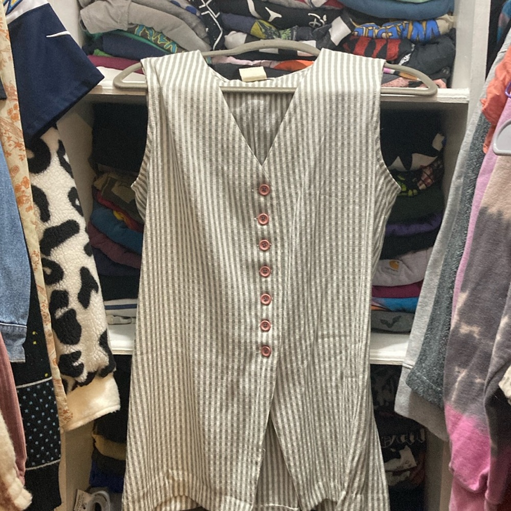 Cream Asymmetrical Sleeveless Button Down Blouse